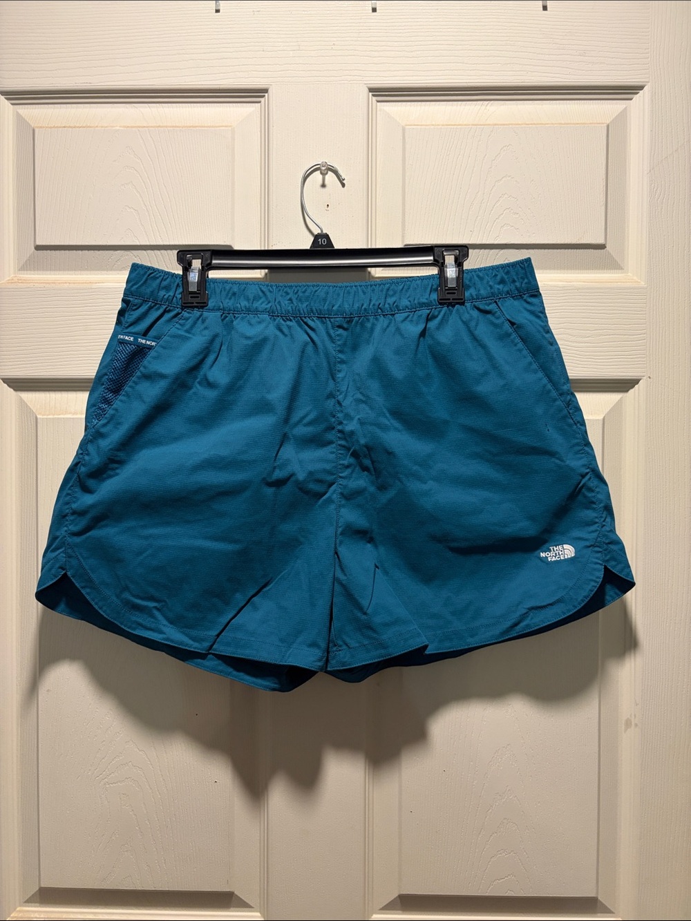 The North Teal Running Shorts
